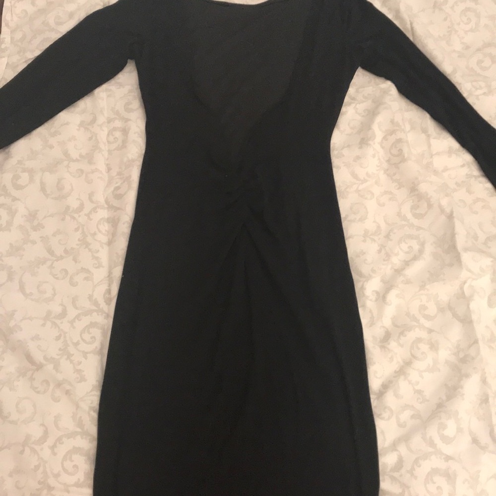Black fitted dress with open back